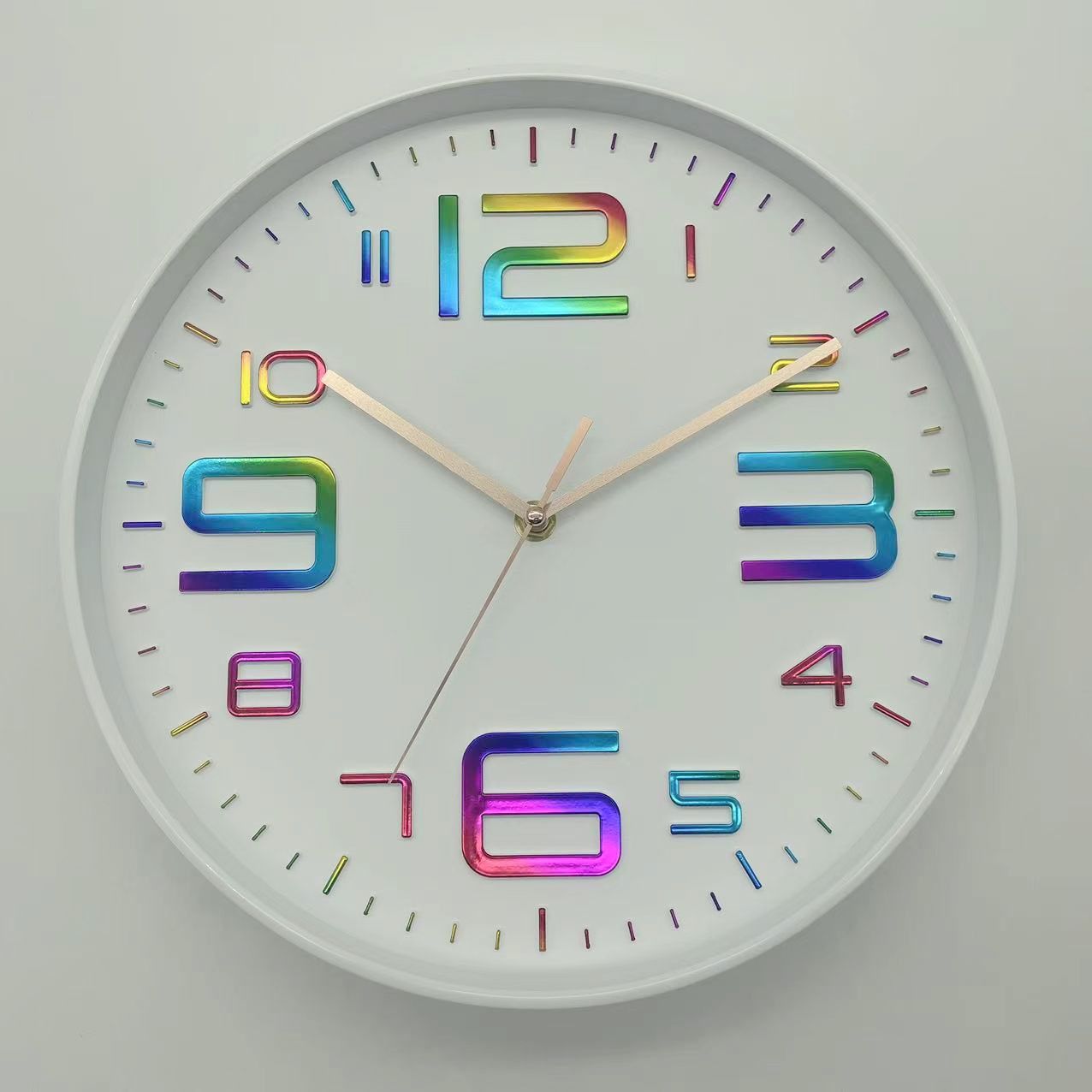 Simple white plastic wall clock with black hands and numbers